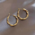 Elegant golden knotted earrings